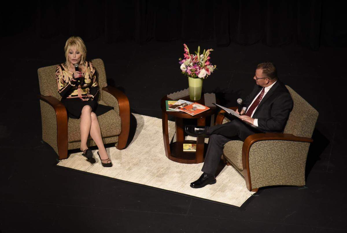 Dolly Parton takes questions from State Superintendent of Public Instruction Chris Reykdal during an event to celebrate the expansion of her Imagination Library in Washington. The event was Tuesday, Aug. 15, 2023.