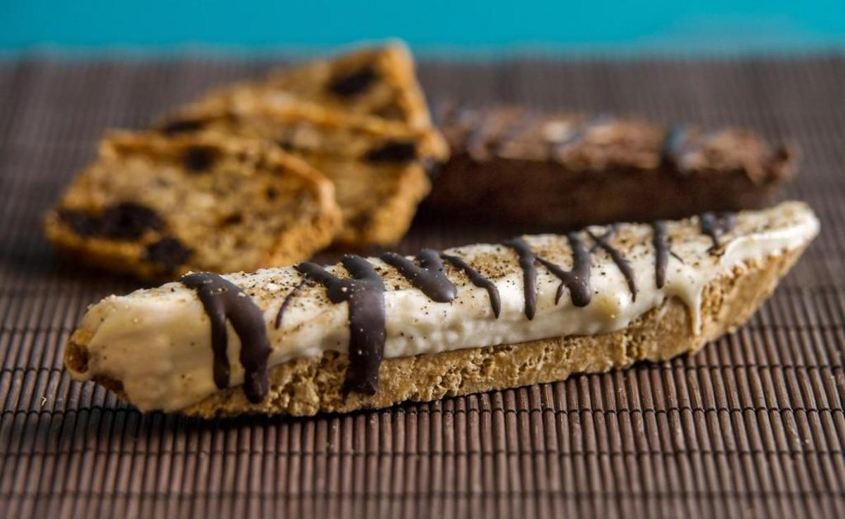 Rhonda Hamlin makes and sells biscotti and other artisan hand-made treats under the name The Art of Crunch. In the foreground is a tiramisu biscotto.