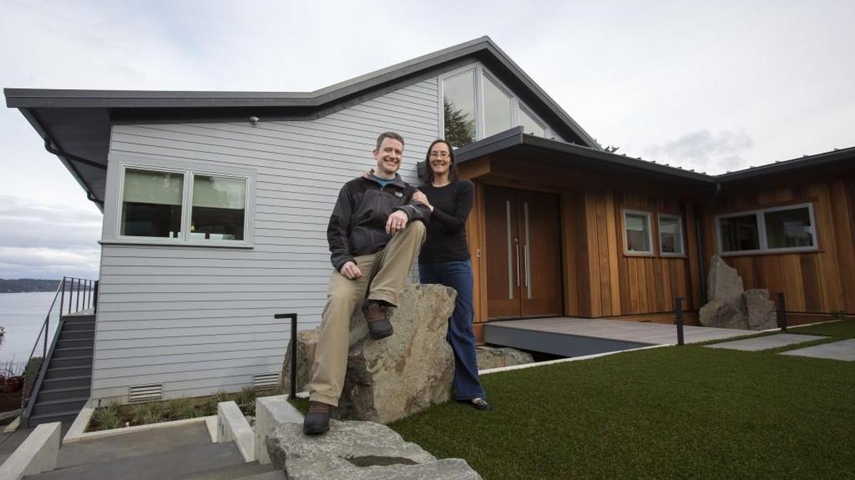 Joel and Teresa McFarland sit outside their Gig Harbor home.