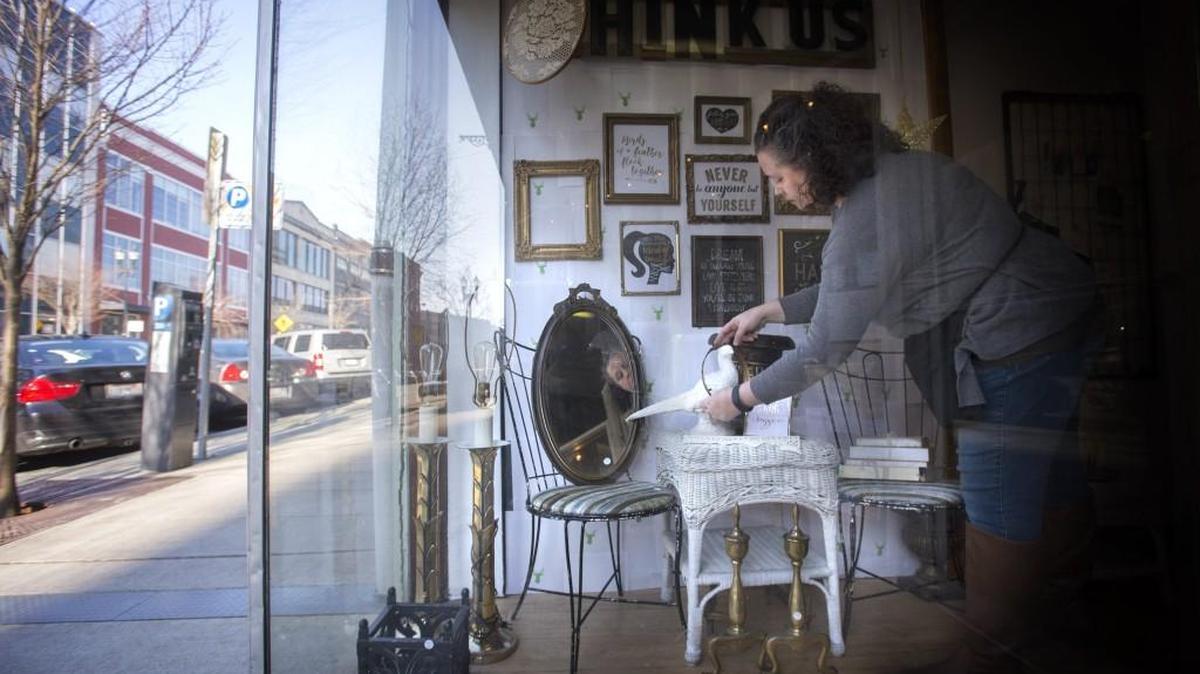 Summer Briggs works on the display in her business at Urban Squirrel. Briggs will be taking the furnitures on display to the Tacoma Home & Garden Show Vintage Market.