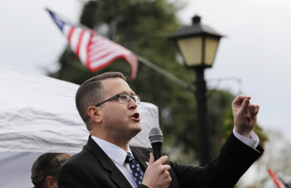 FILE - In this Jan. 18, 2019, file photo, Rep. Matt Shea, R-Spokane Valley, speaks at a gun-rights rally at the Capitol in Olympia, Wash. Recently published internet chats from 2017 show Shea and three other men discussing confronting “leftists” with a variety of tactics, including violence, surveillance and intimidation. The messages prompted Washington House Democrats to demand that Shea be reprimanded for a history of far-right speech and activities.