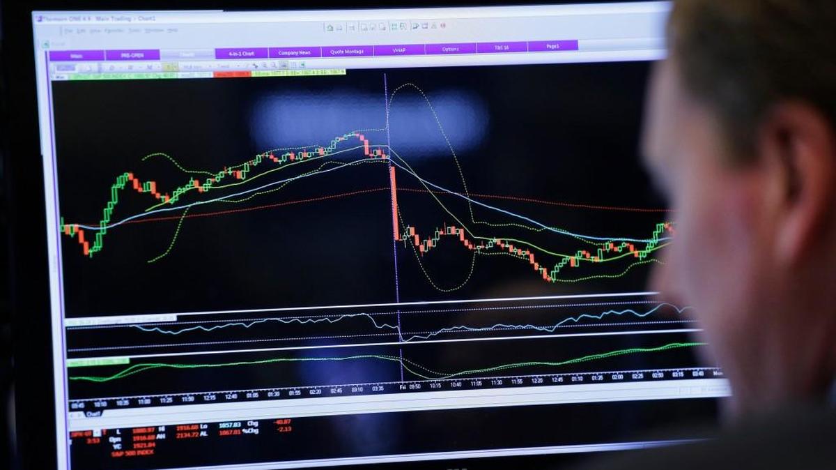A trader monitors stock prices Friday at the New York Stock Exchange. U.S. stocks plunged again Friday, completing the worst two-week start to a year ever.