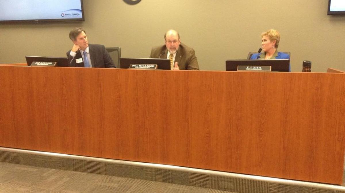Commissioner Bill McGregor (center) argues in favor of seeking bids for the proposed fuel dock at Swantown Marina as commissioners Joe Downing (left) and E.J. Zita listen during Monday night’s port commission meeting. The commission voted 2-1 to seek bids. Commissioner Zita disagreed, saying the fuel dock proposal needs more analysis.