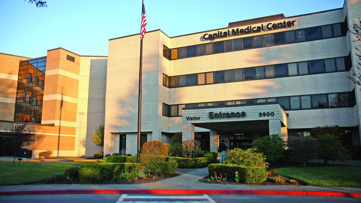The state Attorney General’s Office filed a lawsuit Friday alleging that Capital Medical Center had violated state law by withholding charity care from thousands of low-income patients.