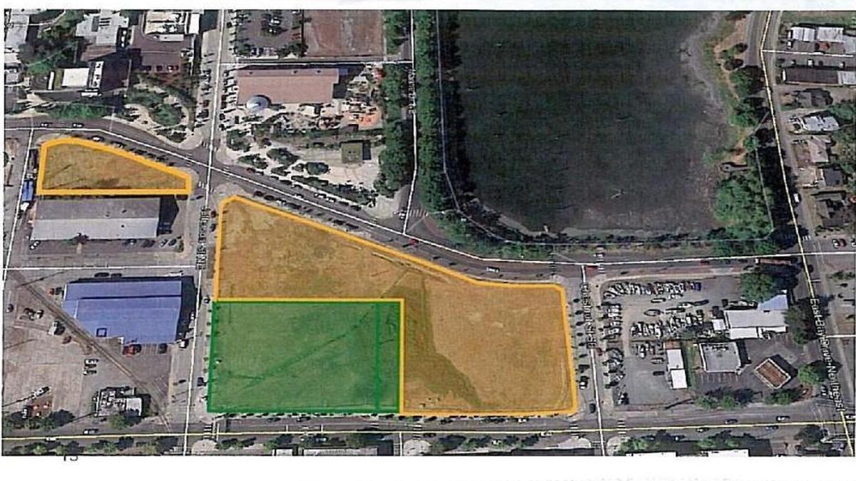 Downtown Olympia developer Walker John wants to bring a mixed-use project to Port of Olympia property, marked here in green. He also wants an option to explore development of the remaining port property, which is highlighted in yellow. The port commission will learn more on Nov. 14 and then vote on Nov. 28.