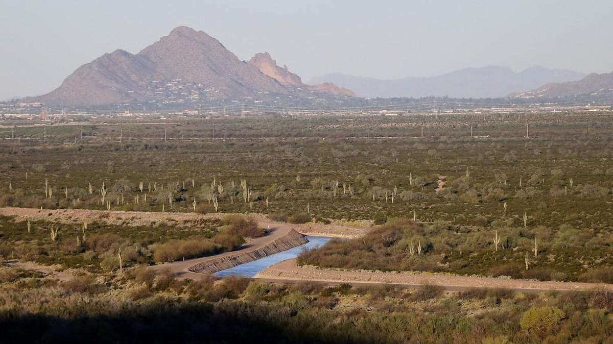 The Central Arizona Project (CAP) canal cuts through the desert in Mesa, Ariz. The 336-mile long system of aqueducts, tunnels, pumping plants and pipelines is the largest single resource of renewable water supplies in the state of Arizona. Potentially hundreds of Boeing jobs are moving from the Seattle area to Mesa.