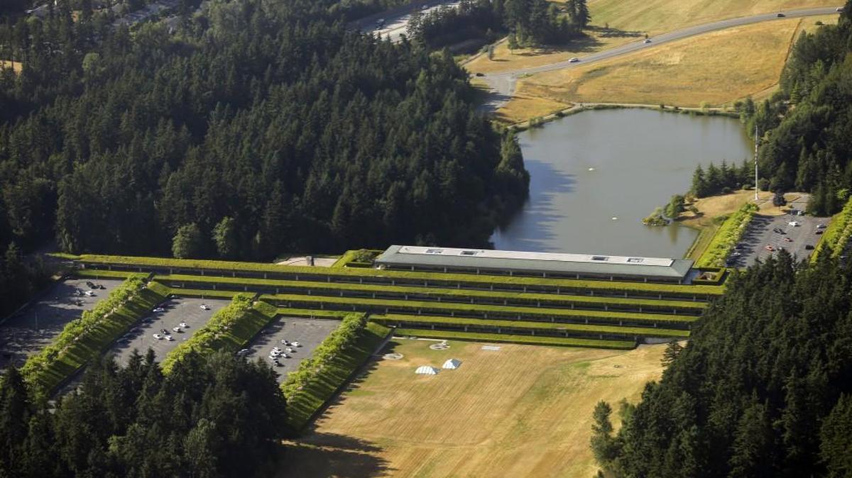 In this aerial photo taken July 17, 2014, the former headquarters for the timber products company Weyerhaeuser is shown in Federal Way. Leaders from surrounding neighborhoods had formed an opposition coalition in August after being blindsided by the plan to build a $55 million plant for Orca Bay Seafoods and Preferred Freezer Services on the southern part of the 130-acre campus. It was part of a broader vision by the site’s new owners to add more than 1 million square feet of warehouses to the area off Interstate 5.