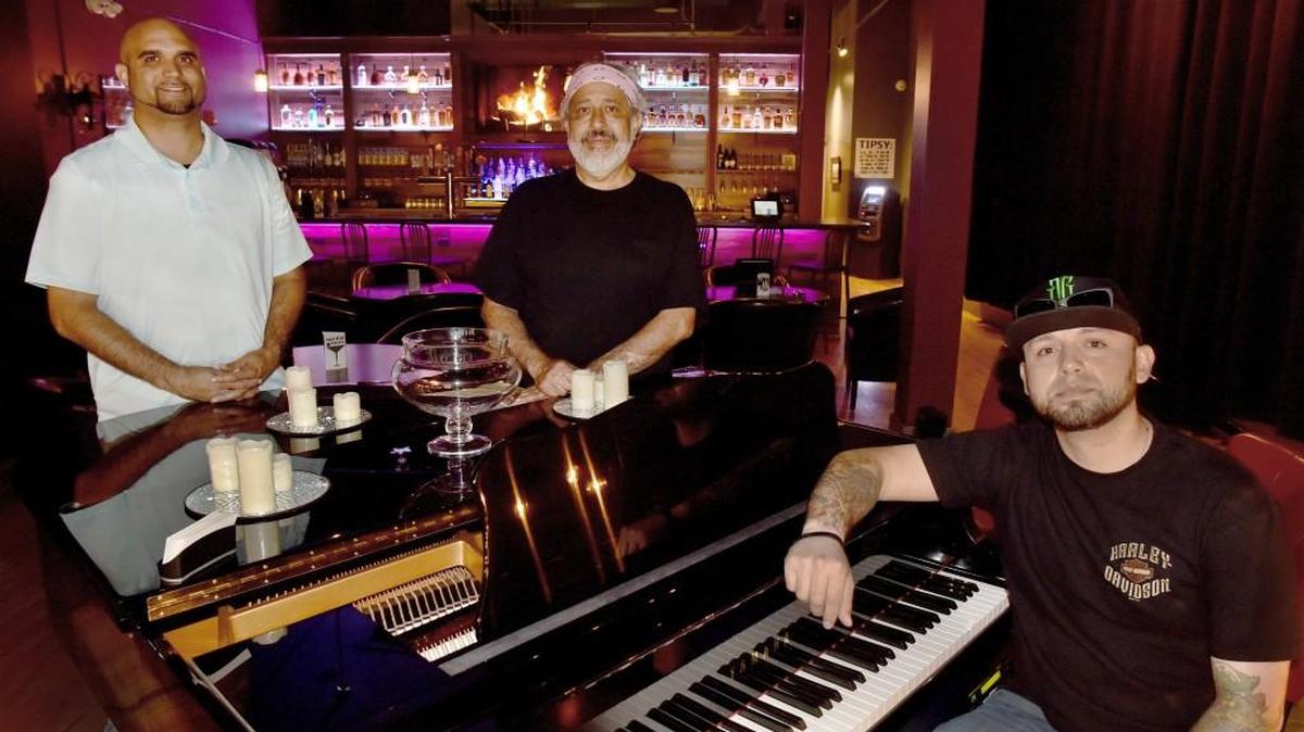 Tipsy Piano Bar co-owner Jonas Rodriguez along with chef Joe Rubio and general manager Jeremy Hopkins (right-left) look to serve up music, food and drink with a New Orleans flavor at their Capitol Way establishment.
