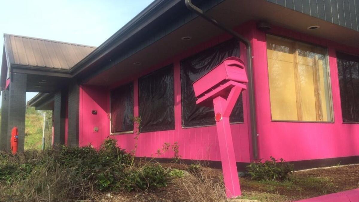 Desire Gentleman’s Club closed in November 2014 and left behind a vacant pink building at 3200 Pacific Ave. SE.