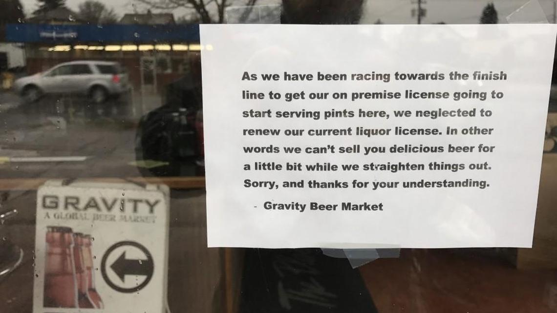 A sign on the door of Gravity Beer Market, 1001 4th Ave. E., Olympia, as seen Dec. 23.