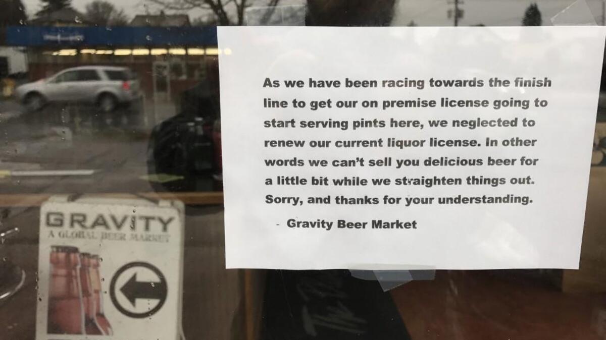 A sign on the door of Gravity Beer Market, 1001 4th Ave. E., Olympia, as seen Dec. 23.