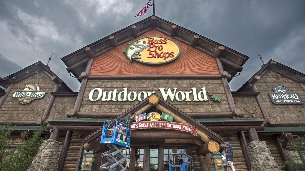 Painters apply the finishing touches to the Bass Pro Shops in Tacoma before its opening in October 2014.