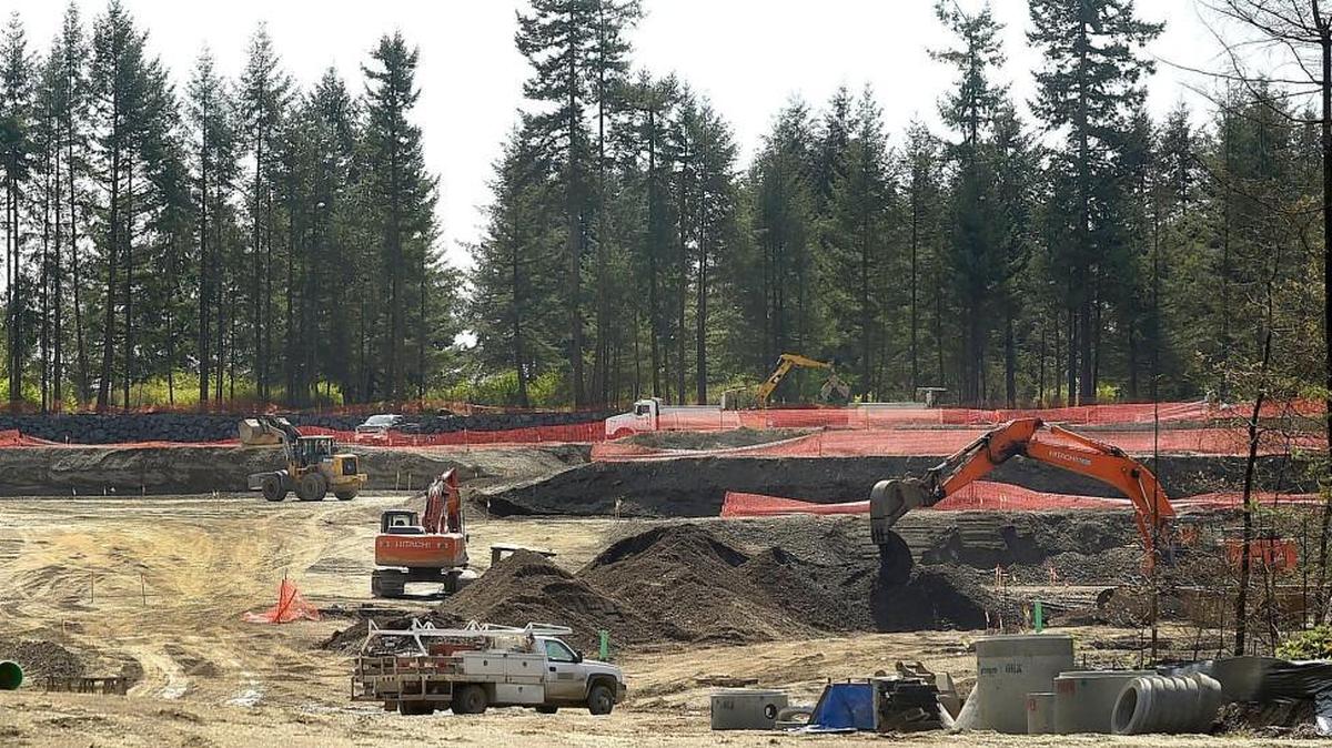 Work rolls along April 6th at the 32-acre construction site at 8549 Martin Way E. for 623 multifamily residential housing units. Located just west of River Ridge High School the development will also include a section designed for senior housing.
