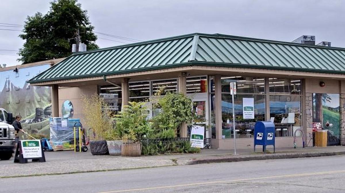 A closed store sign on the driveway at Central Co-op in Tacoma on Monday, July 18, 2016. The co-op is still looking for a new location.