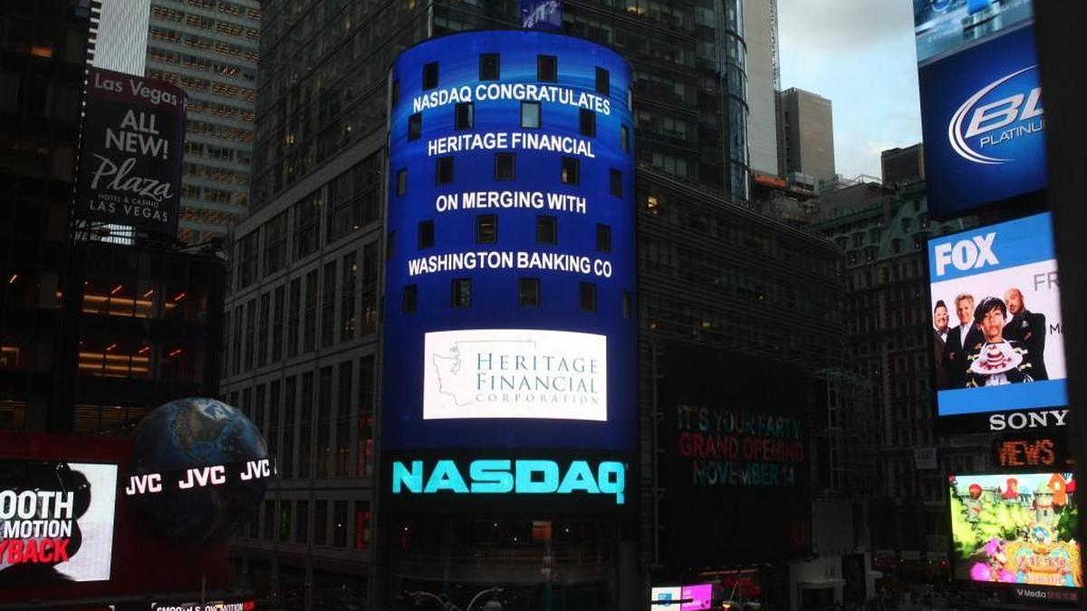 A congratulatory message displayed in New York City after Heritage Financial merged with Washington Banking Co. in 2014.
