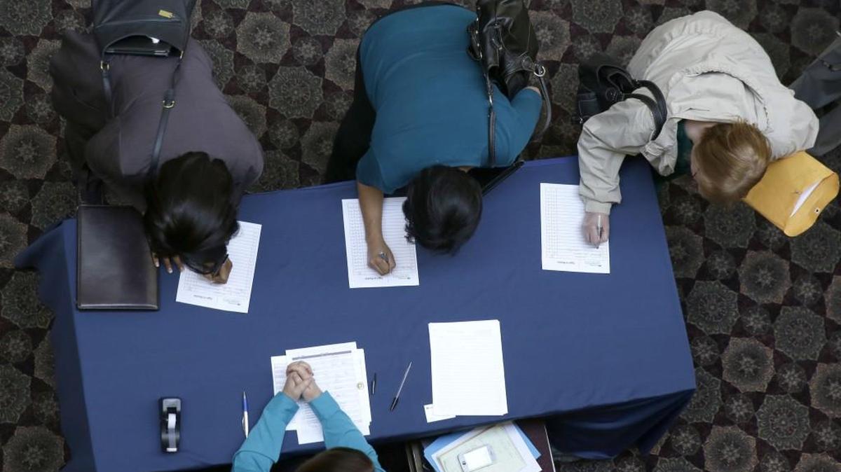Pierce and Thurston county jobless rates held steady in October, though they still were above the statewide and national rates of 5 percent. Pictured is a career fair in Dallas last year.