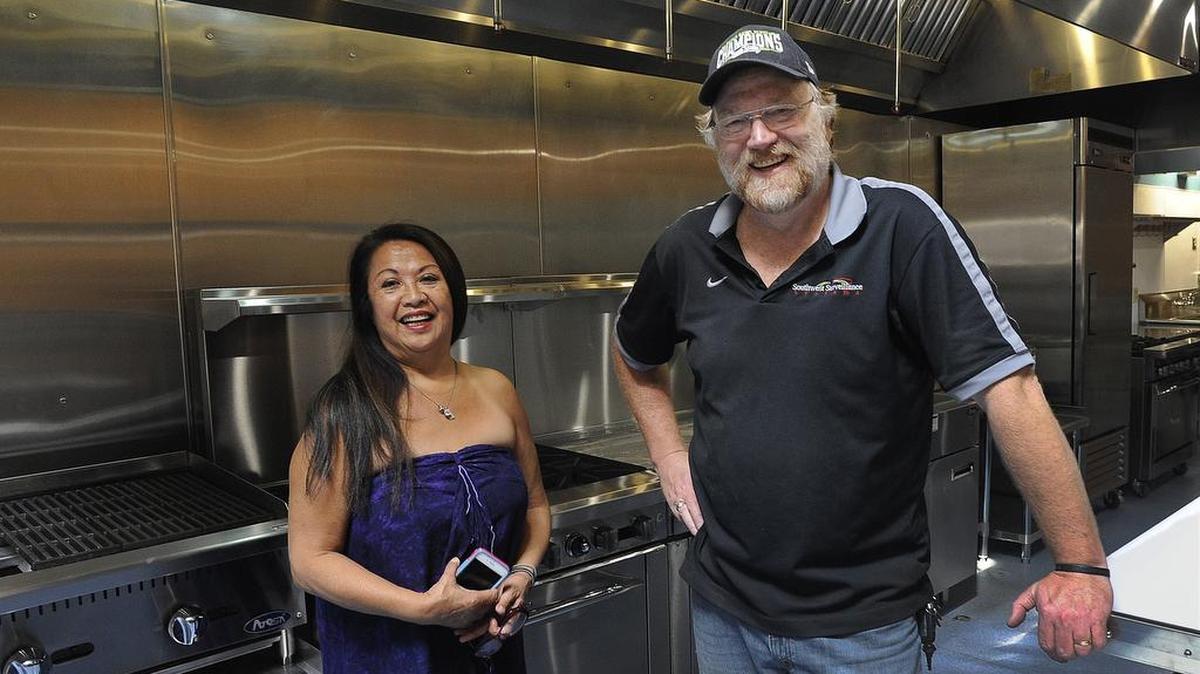 
In the kitchen of their new Olympia restaurant at 514 Capitol Way, The Lanai Cafe business partners Gloria Nahalea and Charlie Wilkins plan an Aug. 31 opening.
