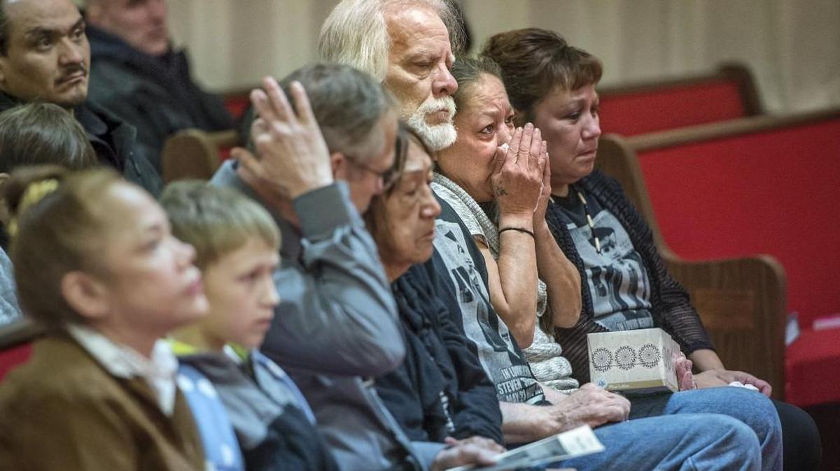 Bill DeMulling, who was a father figure, and Kim Nystrom, the mother of Steven Speakman, share grief and support Saturday during a memorial service at Allen AME Church for Speakman, who was killed on Martin Luther King Way in Tacoma Nov. 3 about two blocks from home.