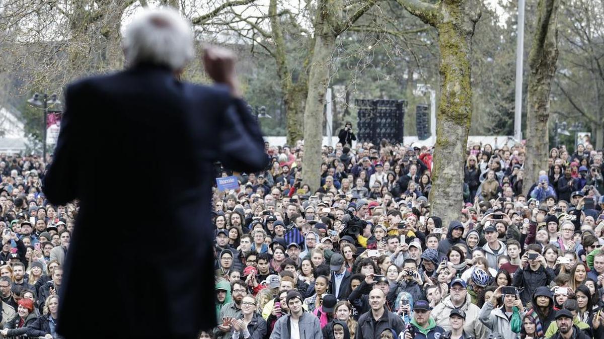 Democratic presidential candidate Sen. Bernie Sanders, I-Vt. speaks to an overflow crowd on Sunday before a campaign rally in Seattle.