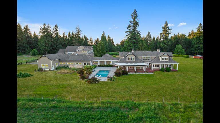 ‘Ultimate retreat’ — with a barn and helicopter shop — is for sale in Olympia