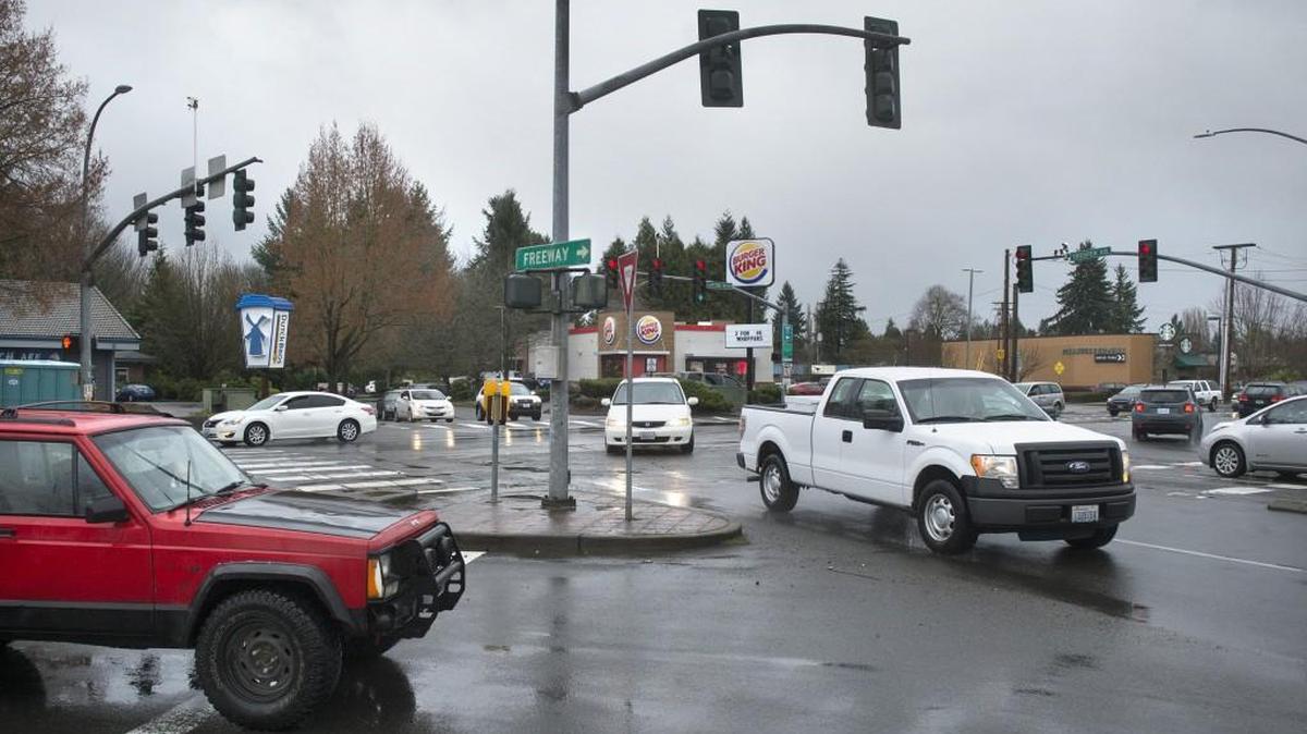 Traffic rolls through the busy intersection at Trosper Road and Capitol Boulevard in Tumwater on Friday.