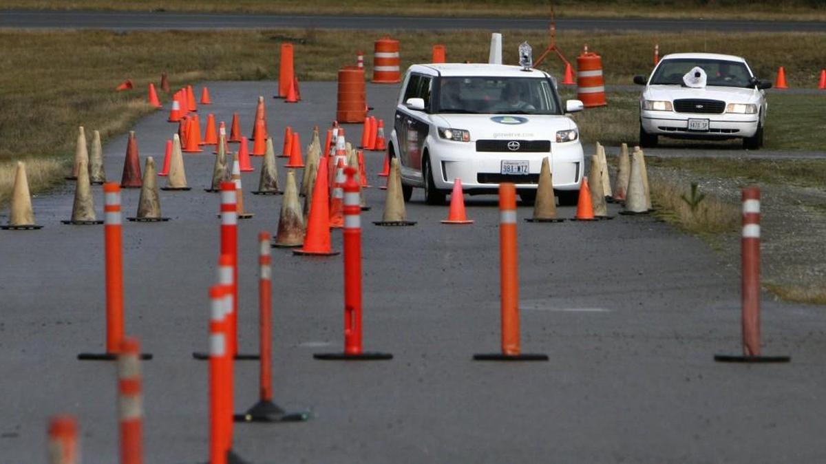 State Troopers monitor a demonstration as individuals drive under the influence of alcohol at the Washington State Patrol Training Academy in Shelton Wednesday morning, October 3, 2007. Students at a Kiwanis law enforcement camp will get to use the course this summer.