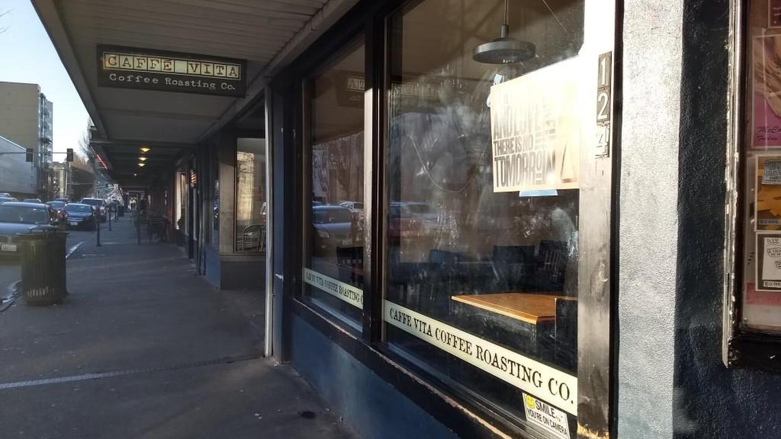 A sign on Caffe Vita’s door says it is permanently closed.