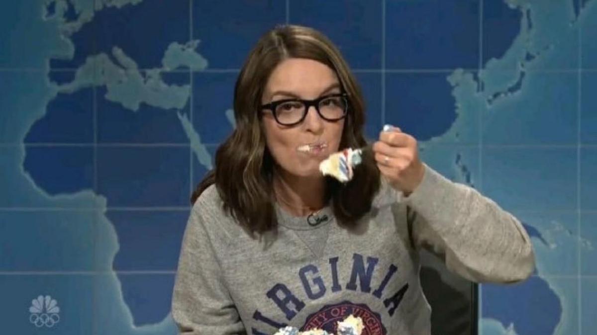Tina Fey stuffing her face with sheet cake on NBC’s “Weekend Update: Summer Edition.”