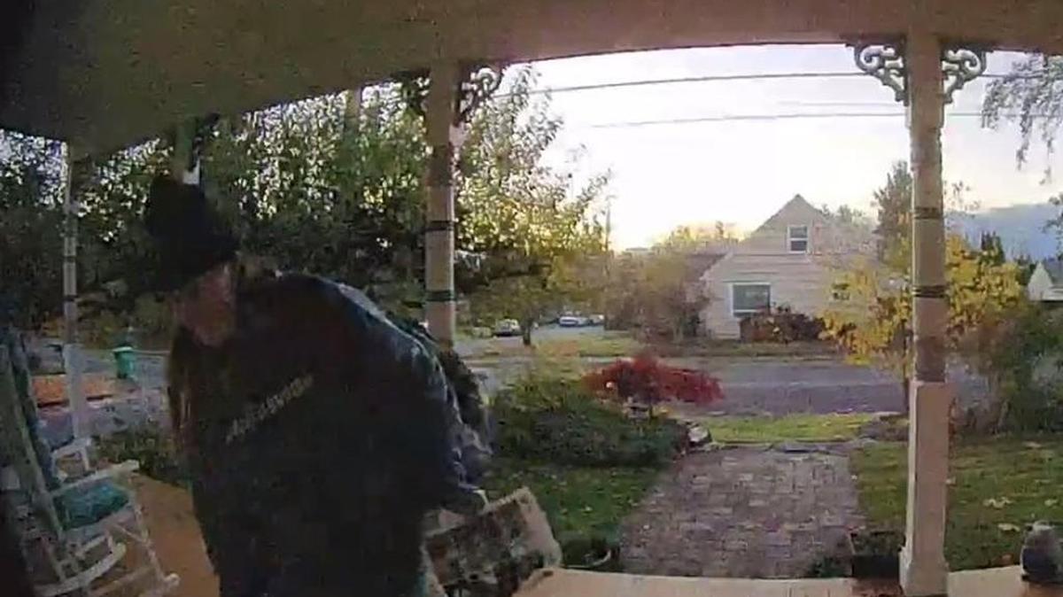 A surveillance camera recorded someone taking packages off the porch of the home on Boundary Street Southeast in Olympia on Nov. 10.