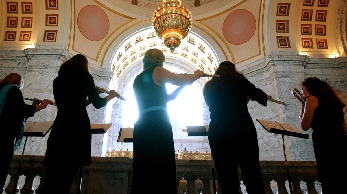 Members of the Olympia Flute Choir fill the state Capitol Rotunda during the 2015 "Flutes in the Rotunda" concert. Hollywood composer, violinist, violist, and pianist Maria Newman will perform there with the Central Washington University Flute Choir at 1 p.m. Saturday.