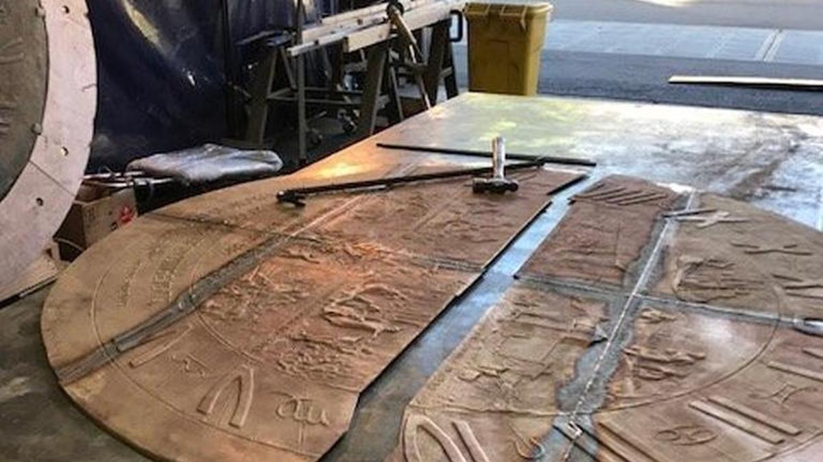Seattle-based contractor Fabrication Specialties used the original sundial as a pattern to mold and re-cast the artwork in bronze.