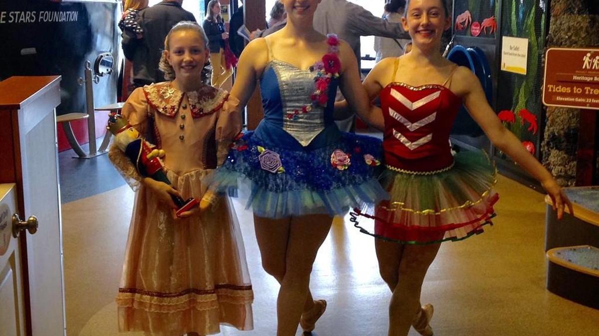 Ballet Northwest ballerinas Katelynn O’Keef, from left, Emily Walter and Brenna Evans visited the Hands On Children’s Museum on Saturday to teach children about “The Nutcracker.”
