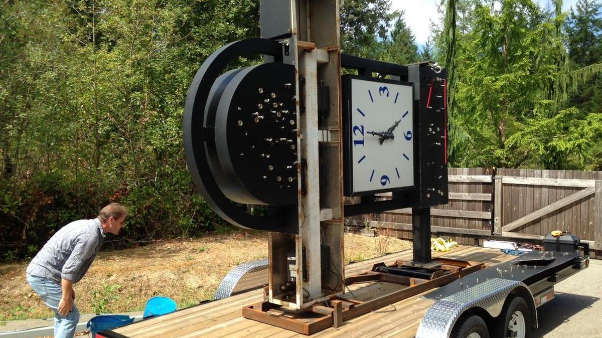 
Olympia resident Bob Presley is restoring the old clock that once hung outside the Miller Brewery.The clock is mounted on a car trailer on hydraulics outside his home.
