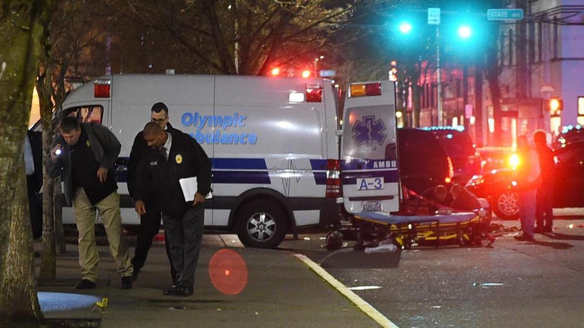 Investigators process the scene outside of the downtown Olympia Intercity Transit Center Monday evening after a man died Monday afternoon during his arrest outside of the facility.