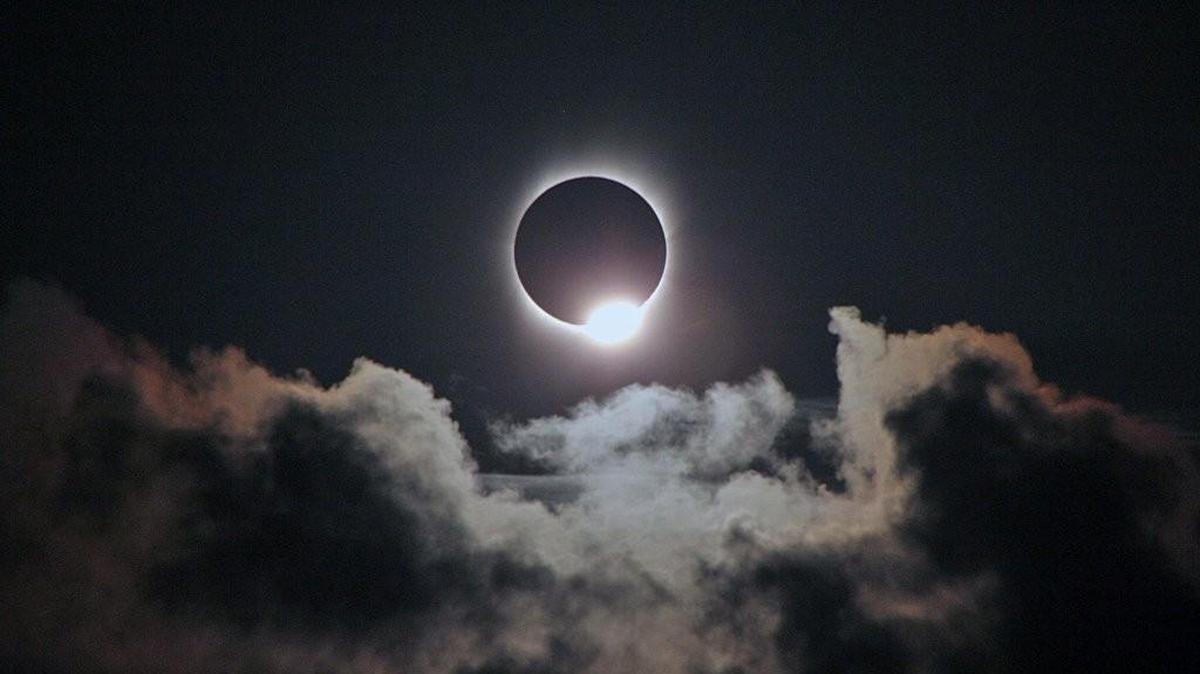 One of the sights associated with a total solar eclipse is the "diamond ring." It appears just before the beginning of totality, when a single bright point of sunlight — the diamond — shines through a deep valley on the Moon's limb (edge) and the inner corona — the ring — becomes visible.