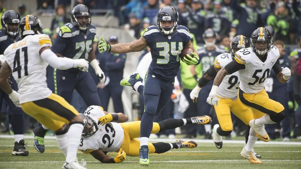 Seahawks running back Thomas Rawls finds open running room against the Steelers defense during Sunday's NFL football game at CenturyLink Field Nov. 29, 2015.