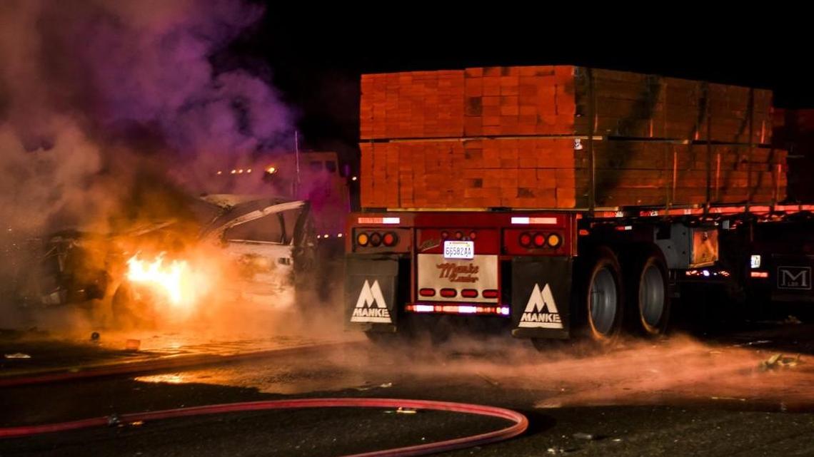 Fire crews respond to the scene of an accident on the southbound lane of Interstate 5 near the Labree Road exit Tuesday morning in Chehalis.