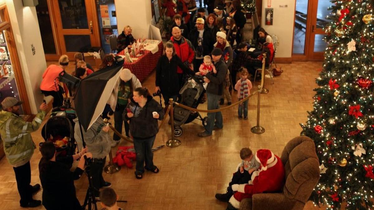 Santa greets local children in the Olympian Hotel lobby during the 2016 Downtown for the Holidays celebration. The annual holiday kickoff event put on by the Olympia Downtown Association will happen Sunday.