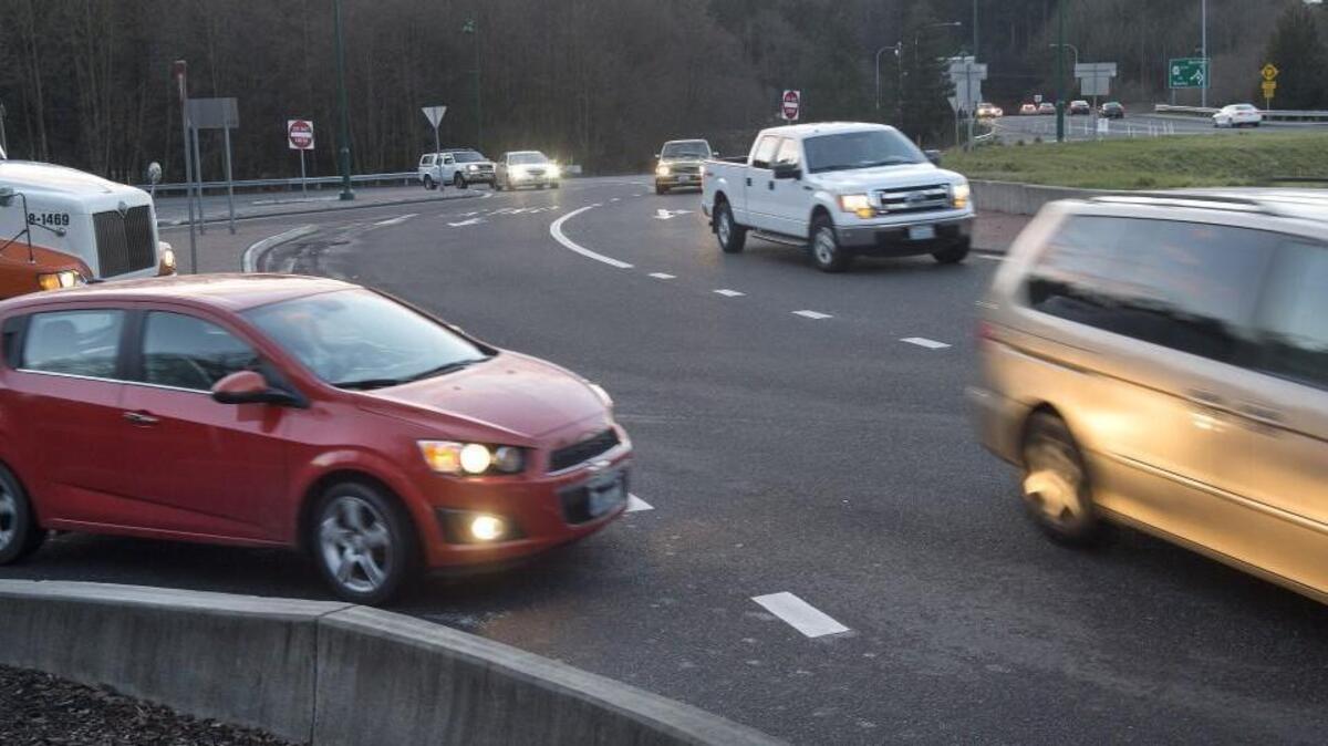 Drivers like the one at left entering this north Gig Harbor roundabout from Burnham Dr. NW were among the few to employ a turn signal on Thursday.