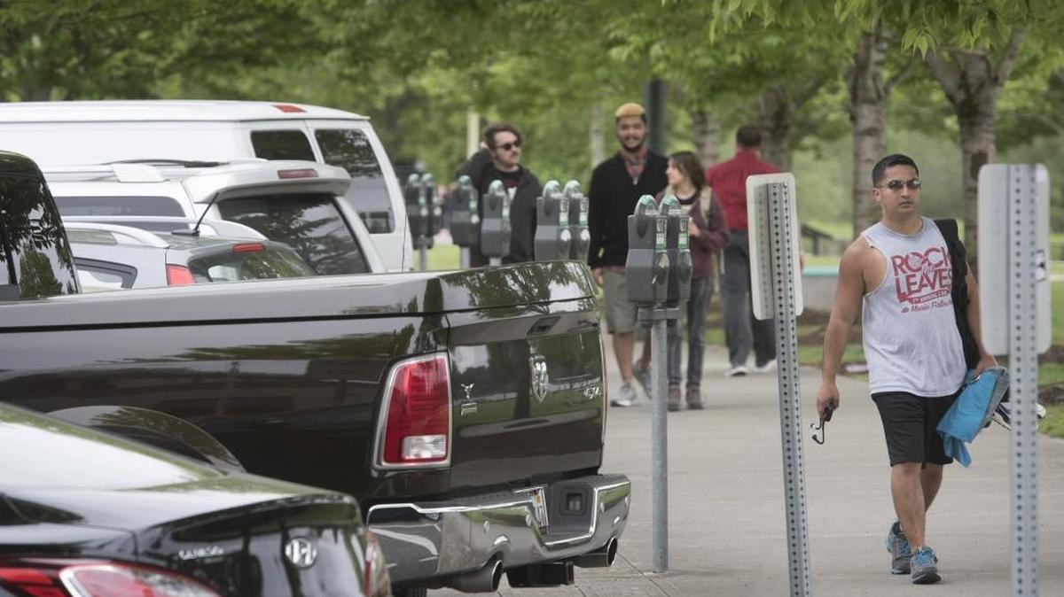 Parked cars line Water Street in downtown Olympia on Wednesday. Olympia will fund a study of parking in downtown.