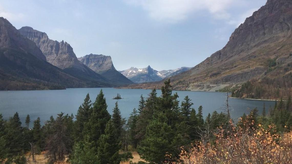 This 2017 photo shows a view of Glacier National Park in Montana from the park's famous Going-to-the-Sun Road. U.S. Interior Department Secretary Ryan Zinke said Friday that he wants to reorganize the agency that oversees vast public lands and energy resources in the West.