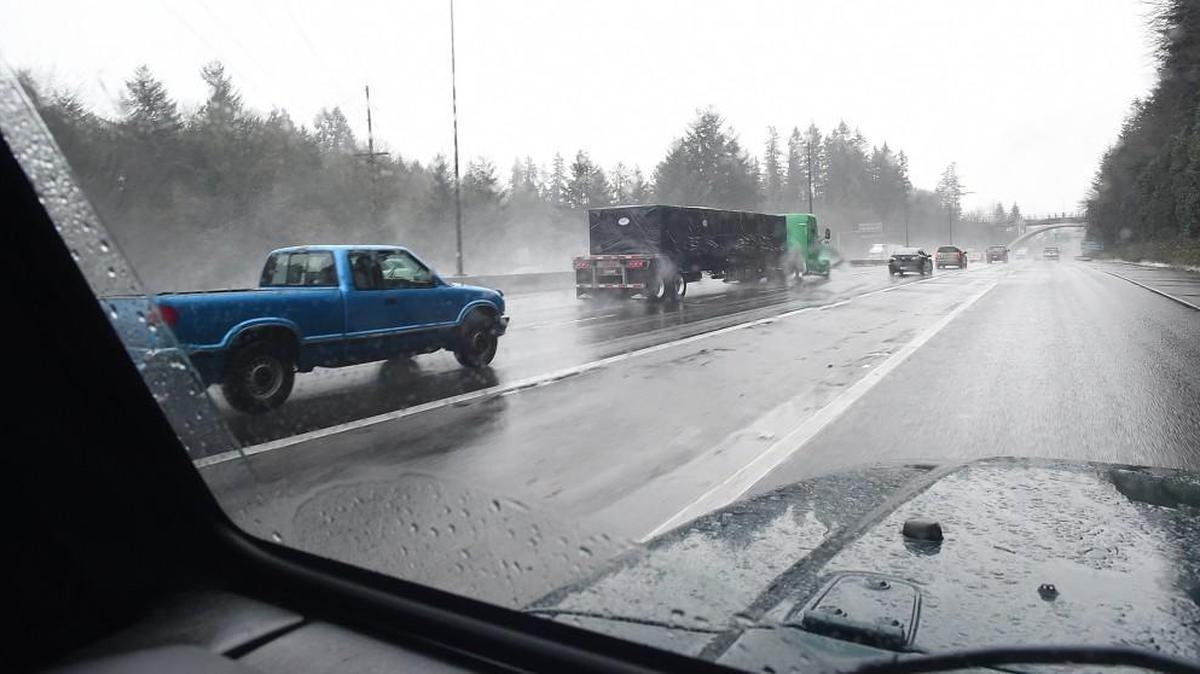 I-5 traffic slogs its way south near the City of Olympia exit as heavy rain took its toll Thursday morning.