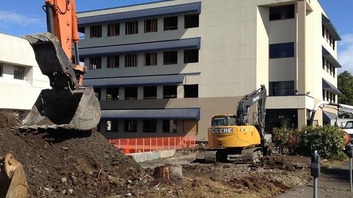 
Work has started on a new project from developer Walker John. Construction crews will turn this former office building near the Capitol Campus into seven townhouse-style apartments and 36 one-bedroom and studio apartments.
