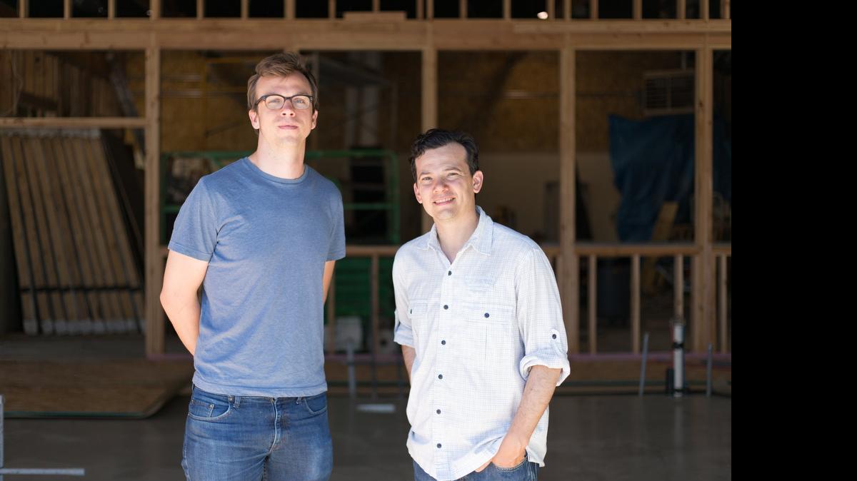
Olympia Coffee Roasting Co. owners Sam Schroeder and Oliver Stormshak at their new location at Cherry Street and Fourth Avenue, which currently is under construction.
