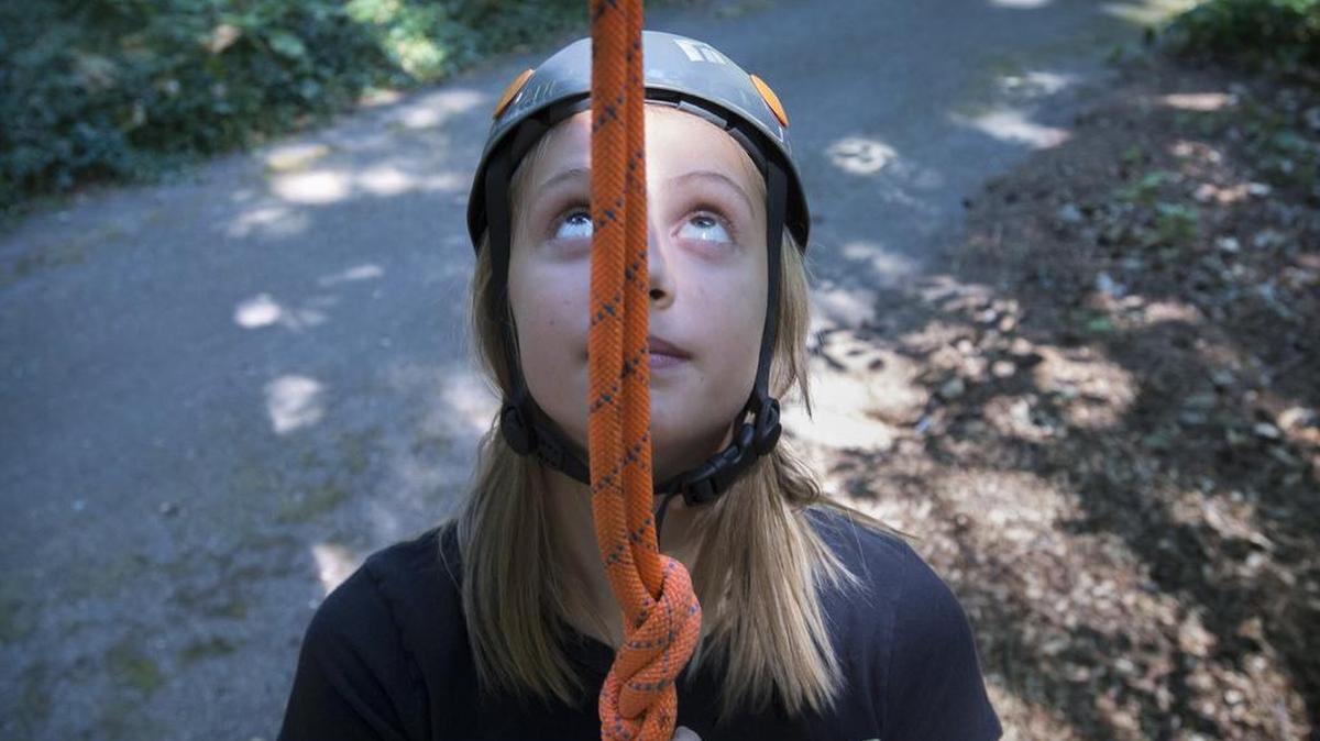
Kyler Elliott ponders the climb 50 feet up into a mature Douglas fir tree during the Olympia Park, Arts & Recreation’s Kids Canopy Climb educational event at Priest Point Park in Olympia on Saturday, Aug. 1, 2015.

