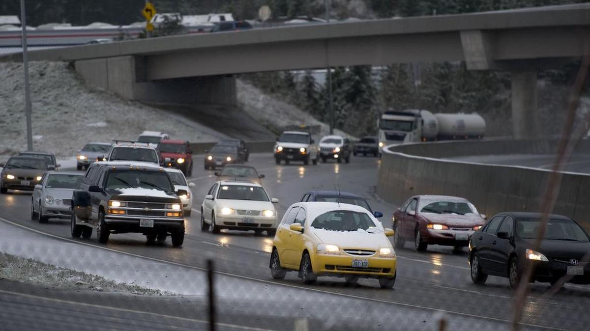 Snow in March isn’t unheard of in Tacoma: Snow-covered traffic moves slowly along eastbound state Route 16 near Union Avenue on March 13, 2012.