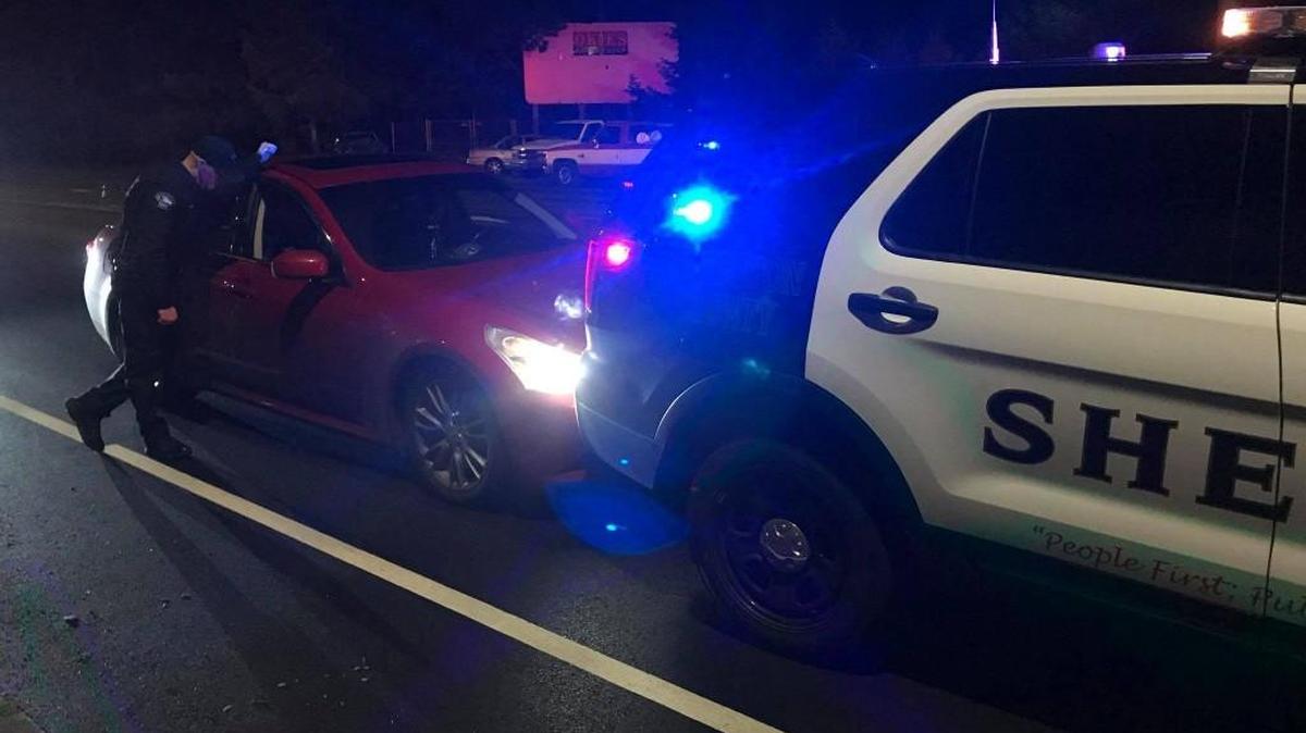 The driver of the red vehicle was arrested on suspicion of driving under the influence and driving with a suspended license Friday night after a collision Thurston County Sheriff’s Vehicle.