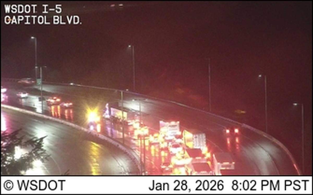 A Washington State Department of Transportation traffic camera shows long backups in the Olympia area after a wreck that involved two semi trailers on both directions of Interstate 5 on Jan. 28, 2026.
