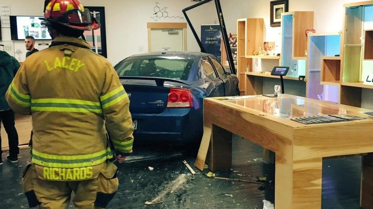 Crews from Lacey Fire had to stabilize a building before removing a car that crashed into a cannabis shop on Monday evening.