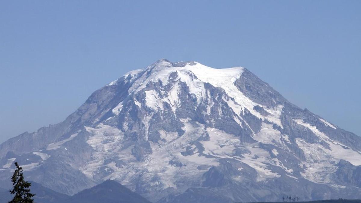 The impact of the record heat and lack of precipitation has made Mount Rainier much less snow covered in recent years.
